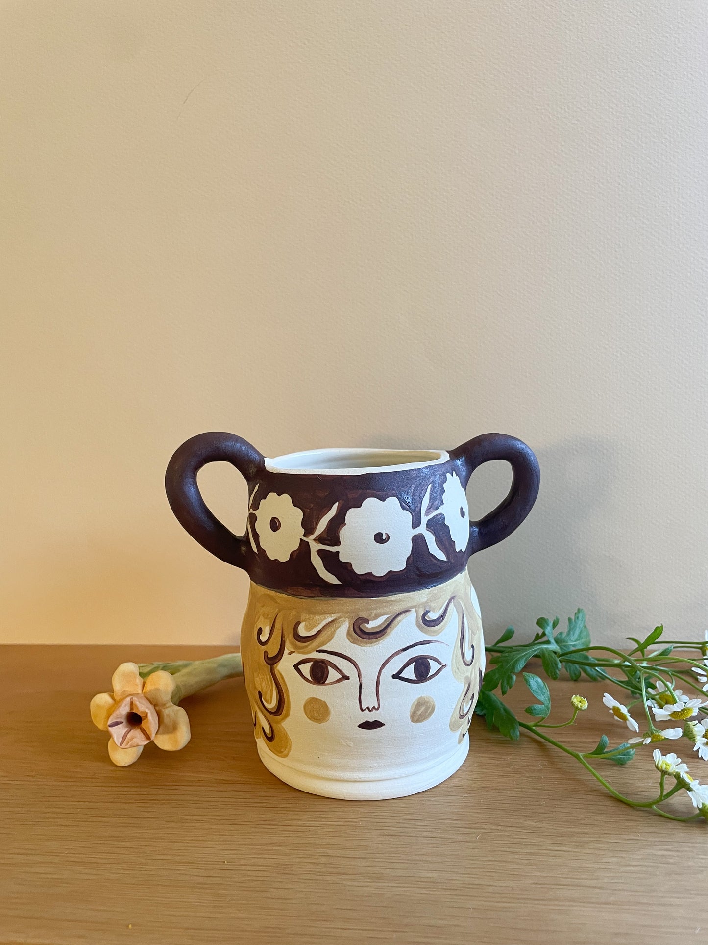 Pot head vase