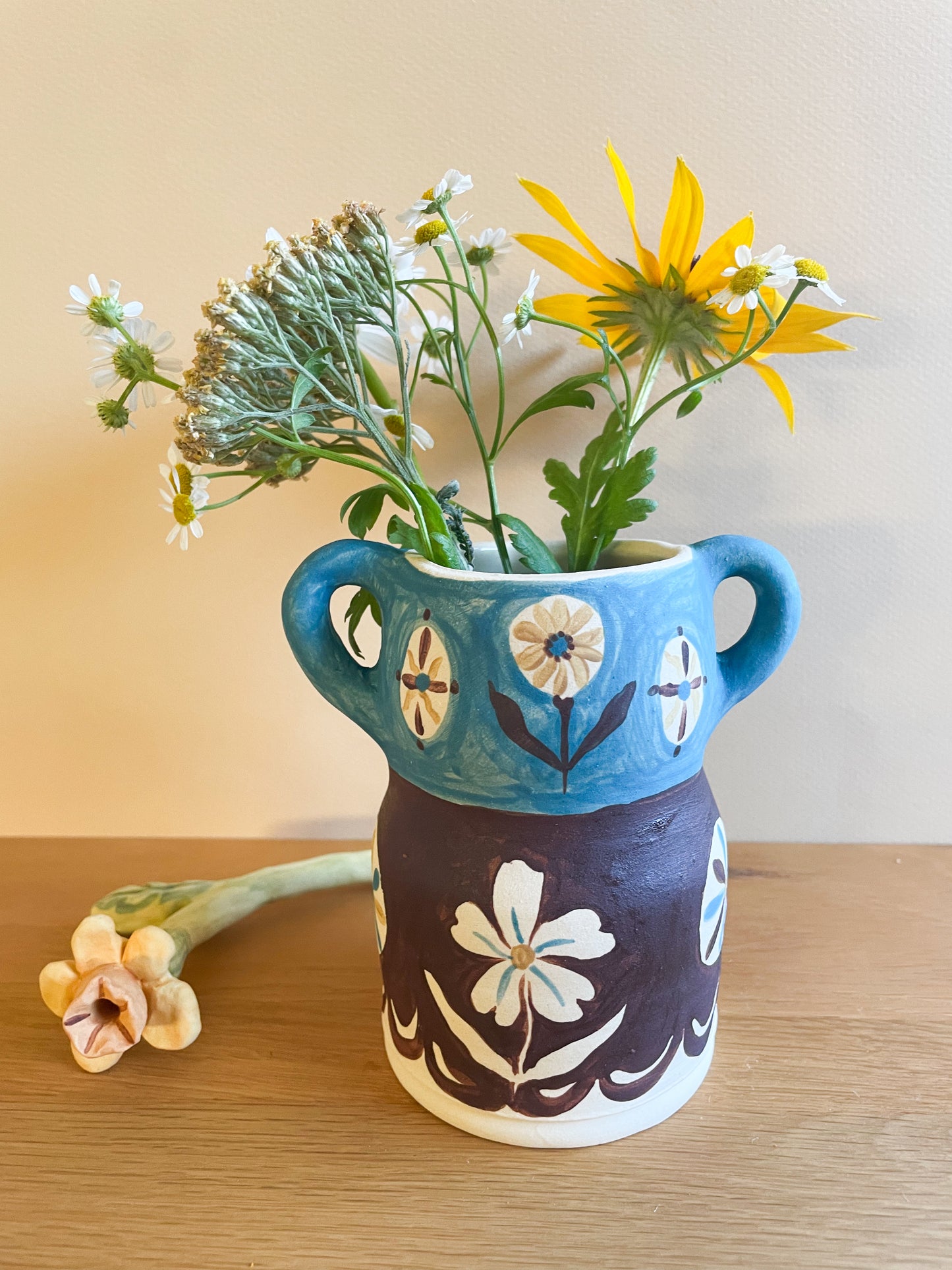 Pot head vase