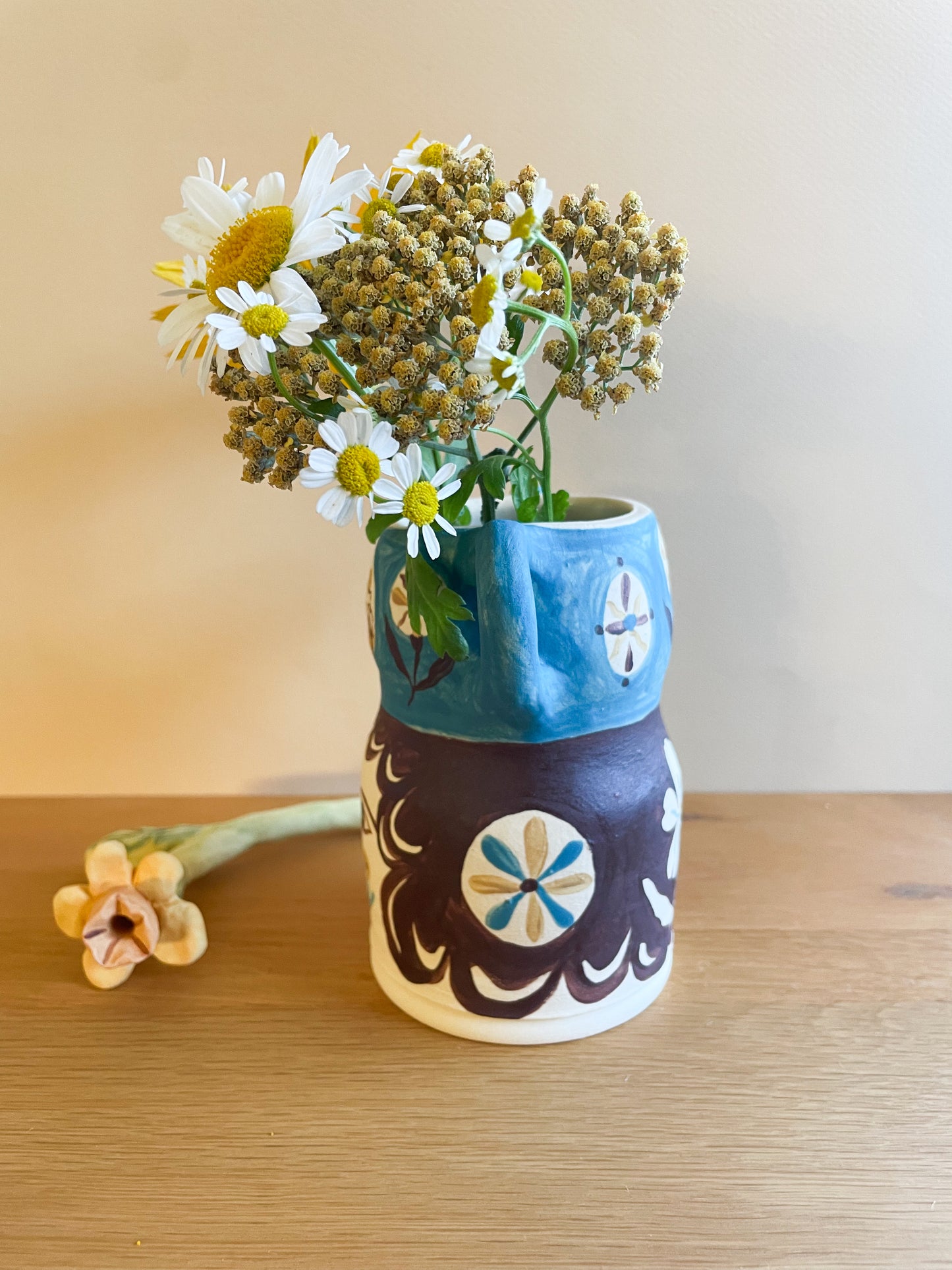 Pot head vase