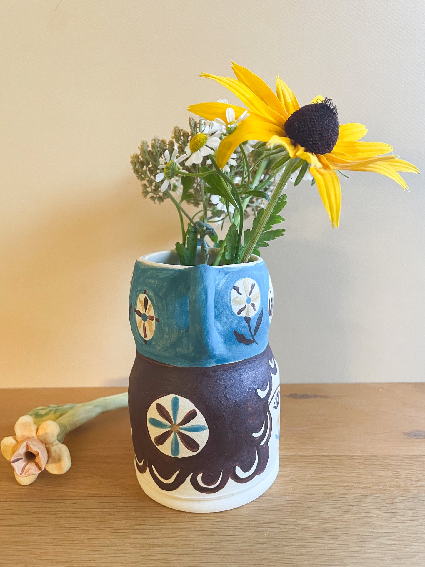 Pot head vase