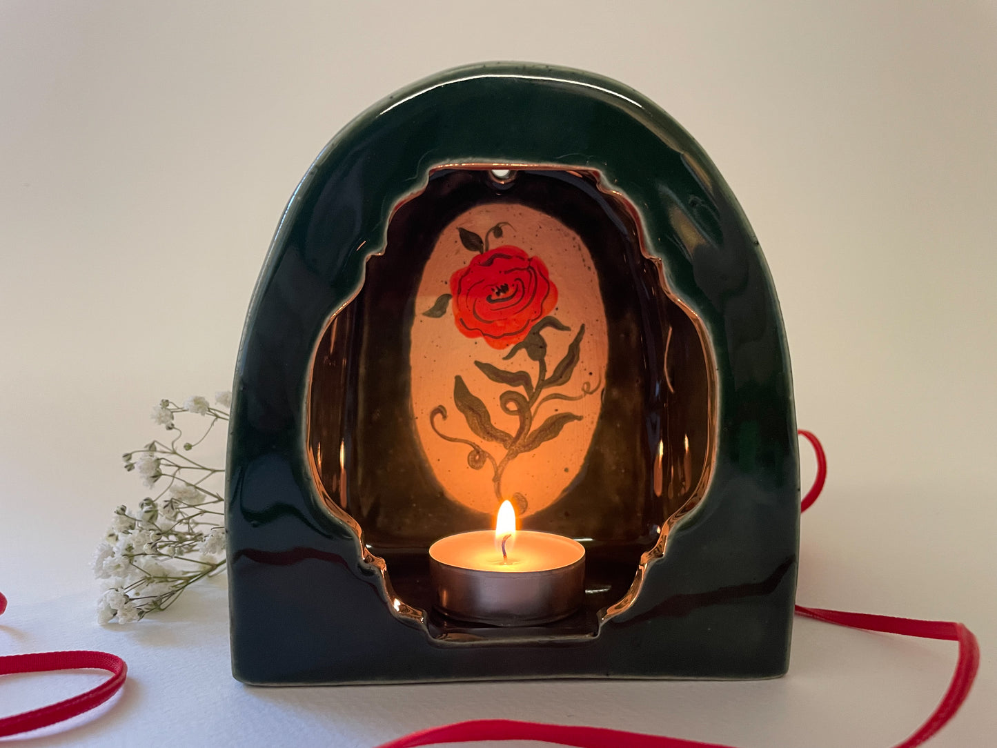 Glowing rose wall shrine