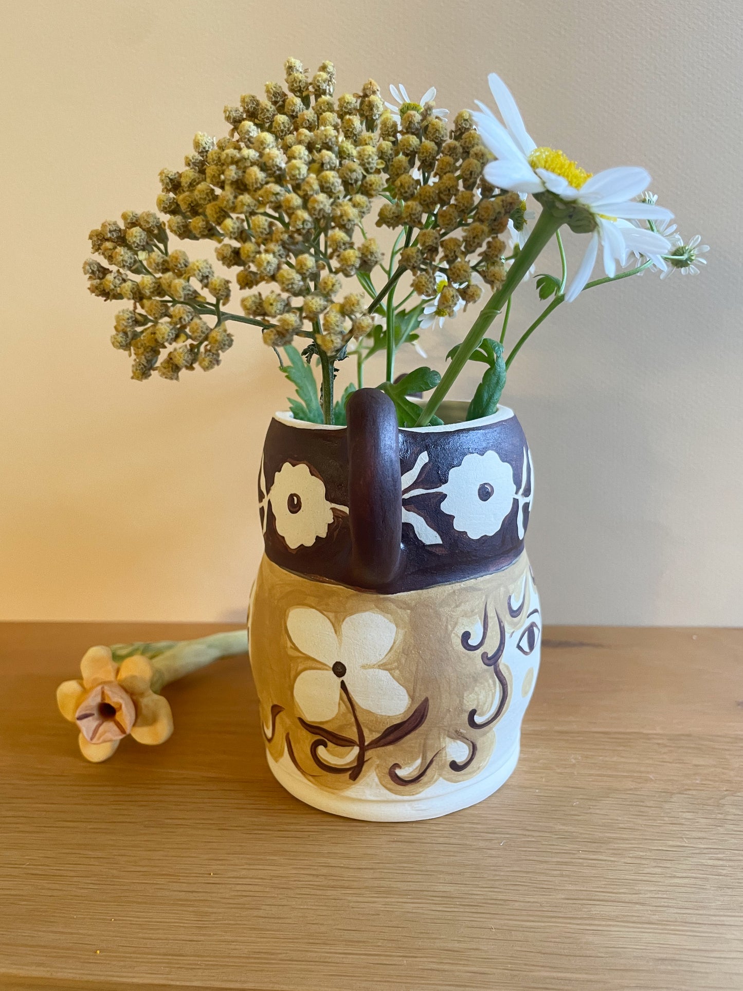 Pot head vase