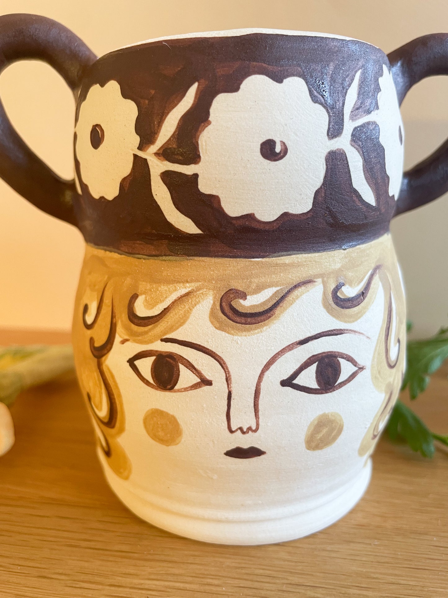 Pot head vase