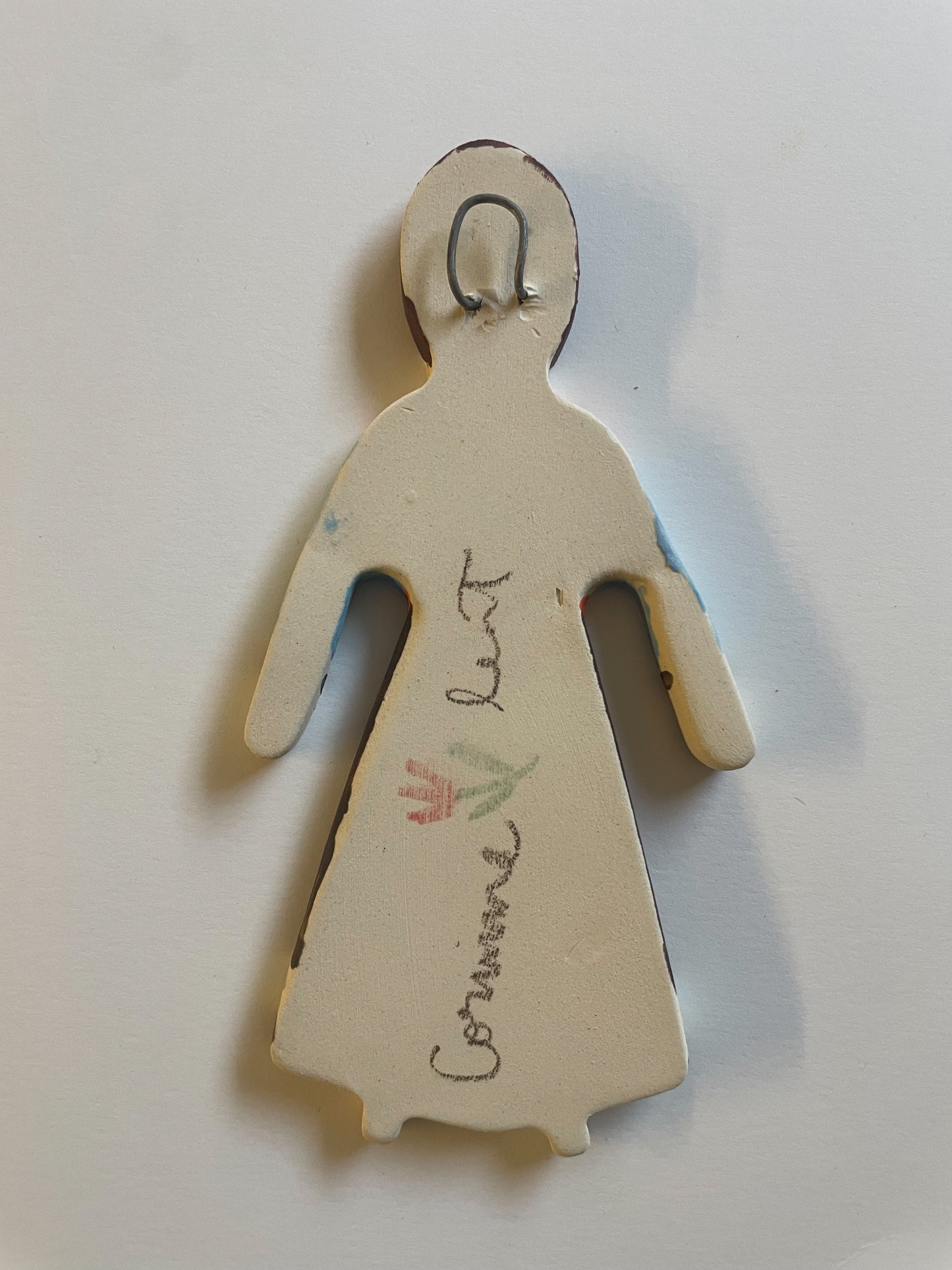 Clay doll wall ornament