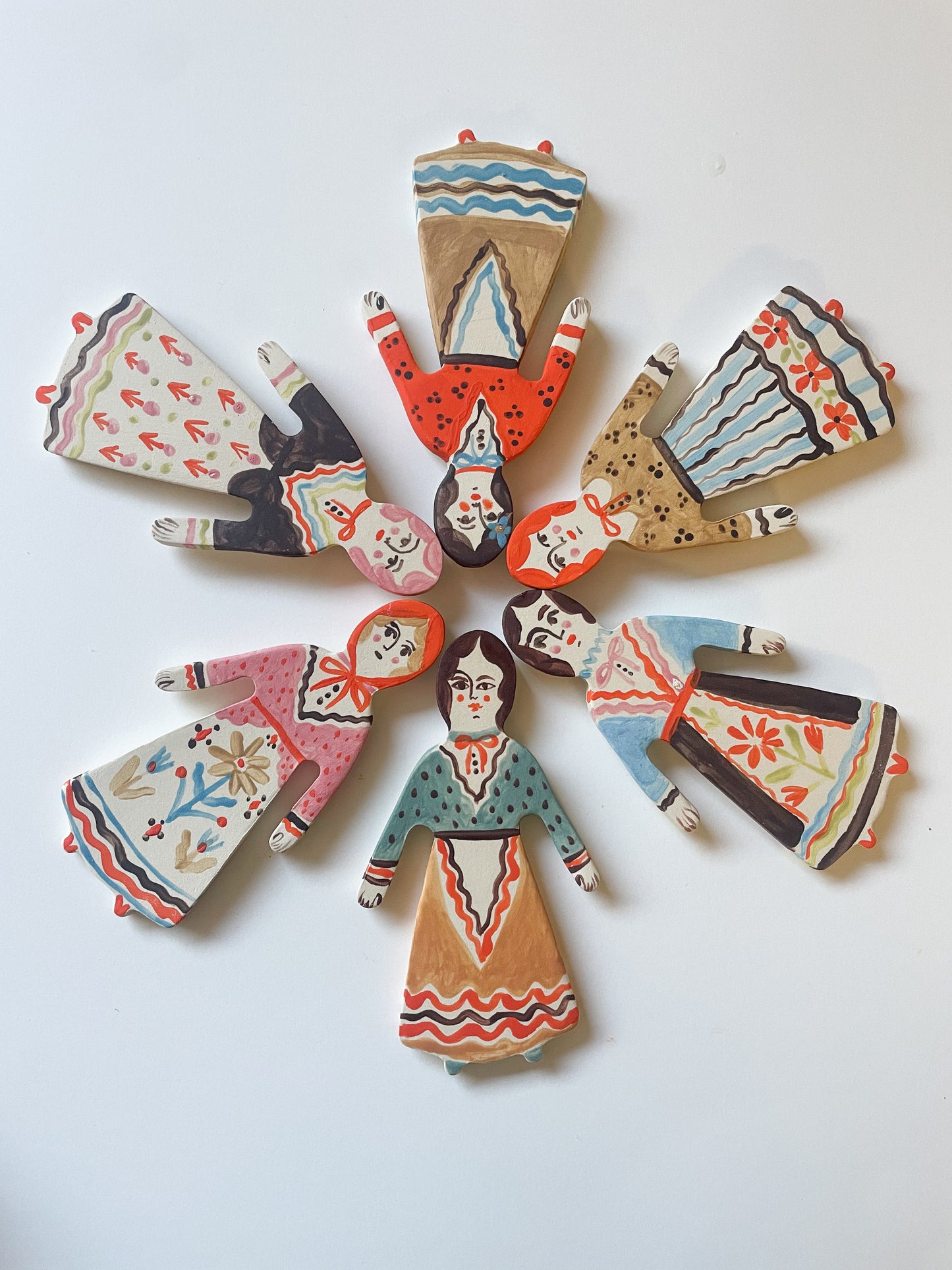 Clay doll wall ornament