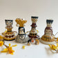 Folk people candlestick *seconds