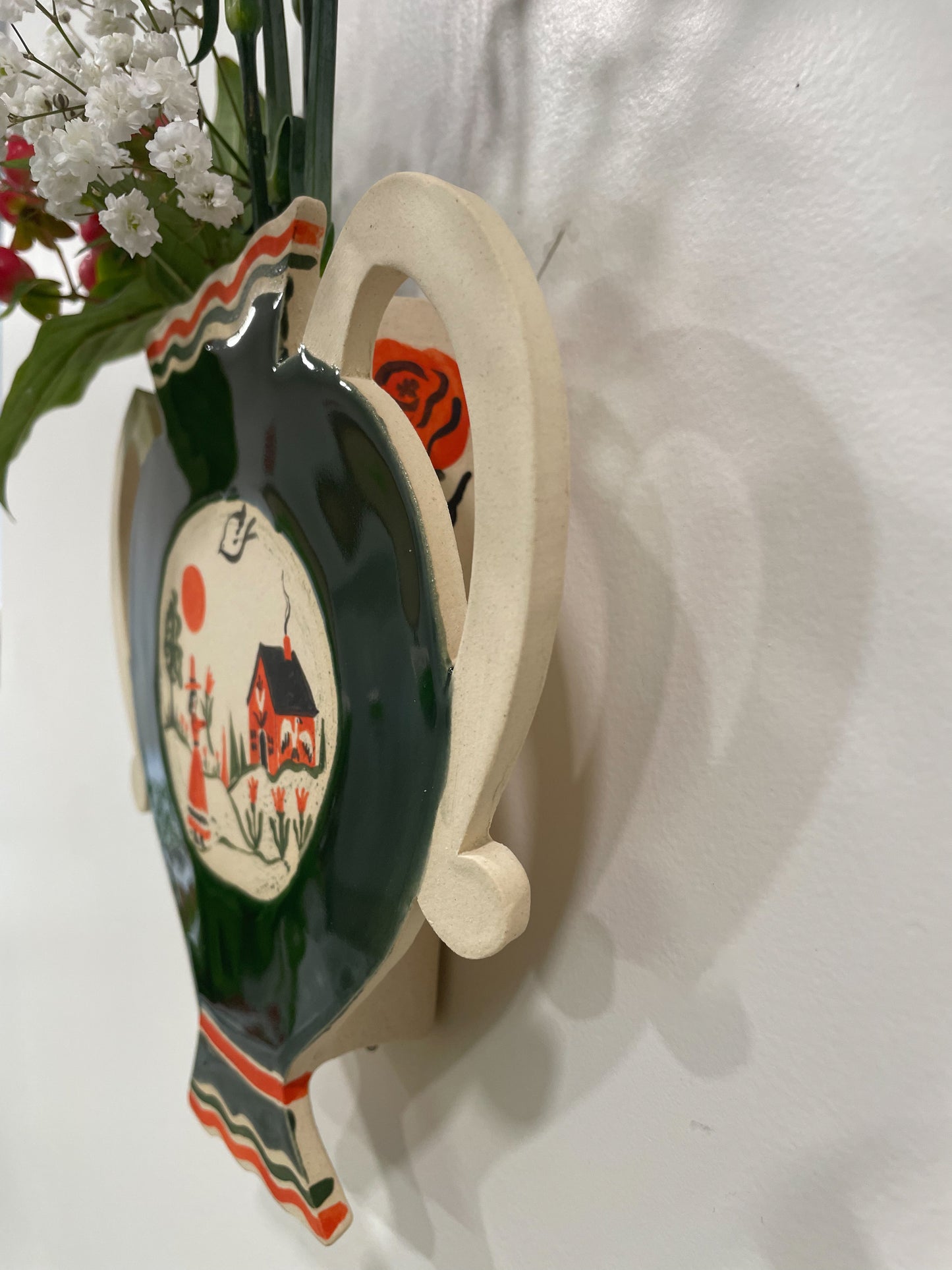 Folk scene wall vase