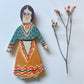 Clay doll wall ornament