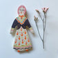 Clay doll wall ornament