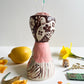 Folk lady pin cushion figurine