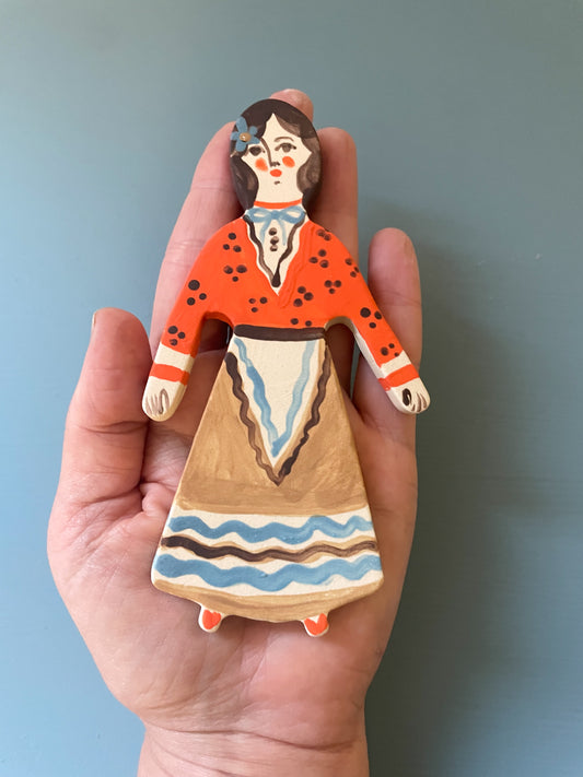 Clay doll wall ornament