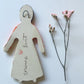 Clay doll wall ornament