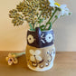 Pot head vase
