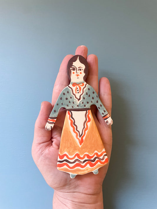 Clay doll wall ornament