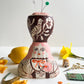 Folk lady pin cushion figurine