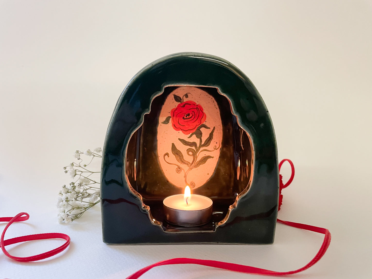 Glowing rose wall shrine