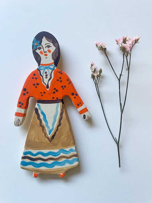 Clay doll wall ornament