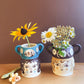 Pot head vase