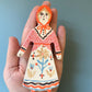 Clay doll wall ornament