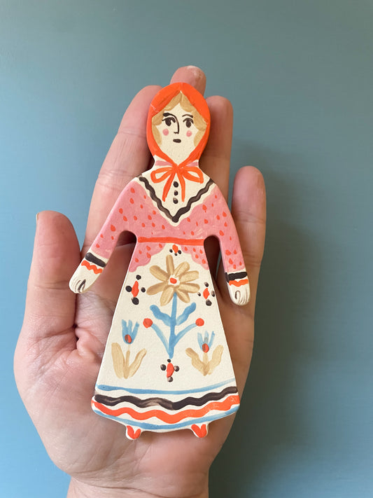Clay doll wall ornament