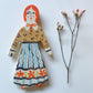 Clay doll wall ornament