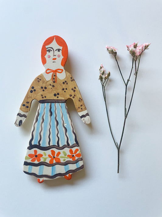 Clay doll wall ornament