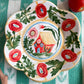 Scalloped small folk plate