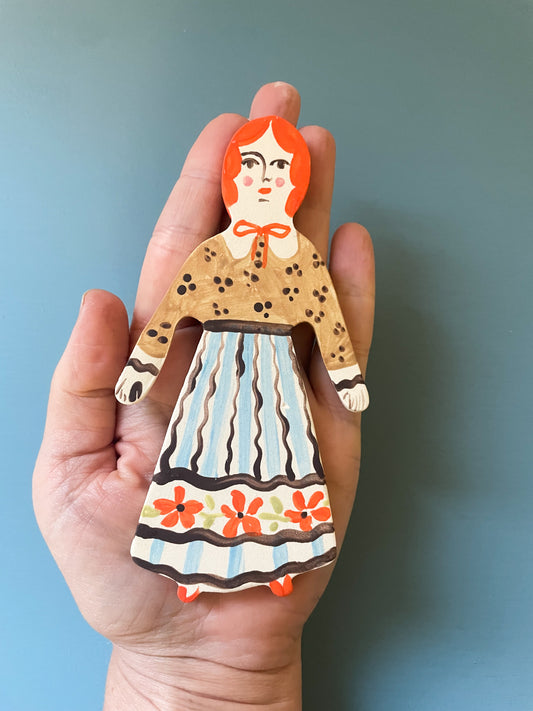 Clay doll wall ornament