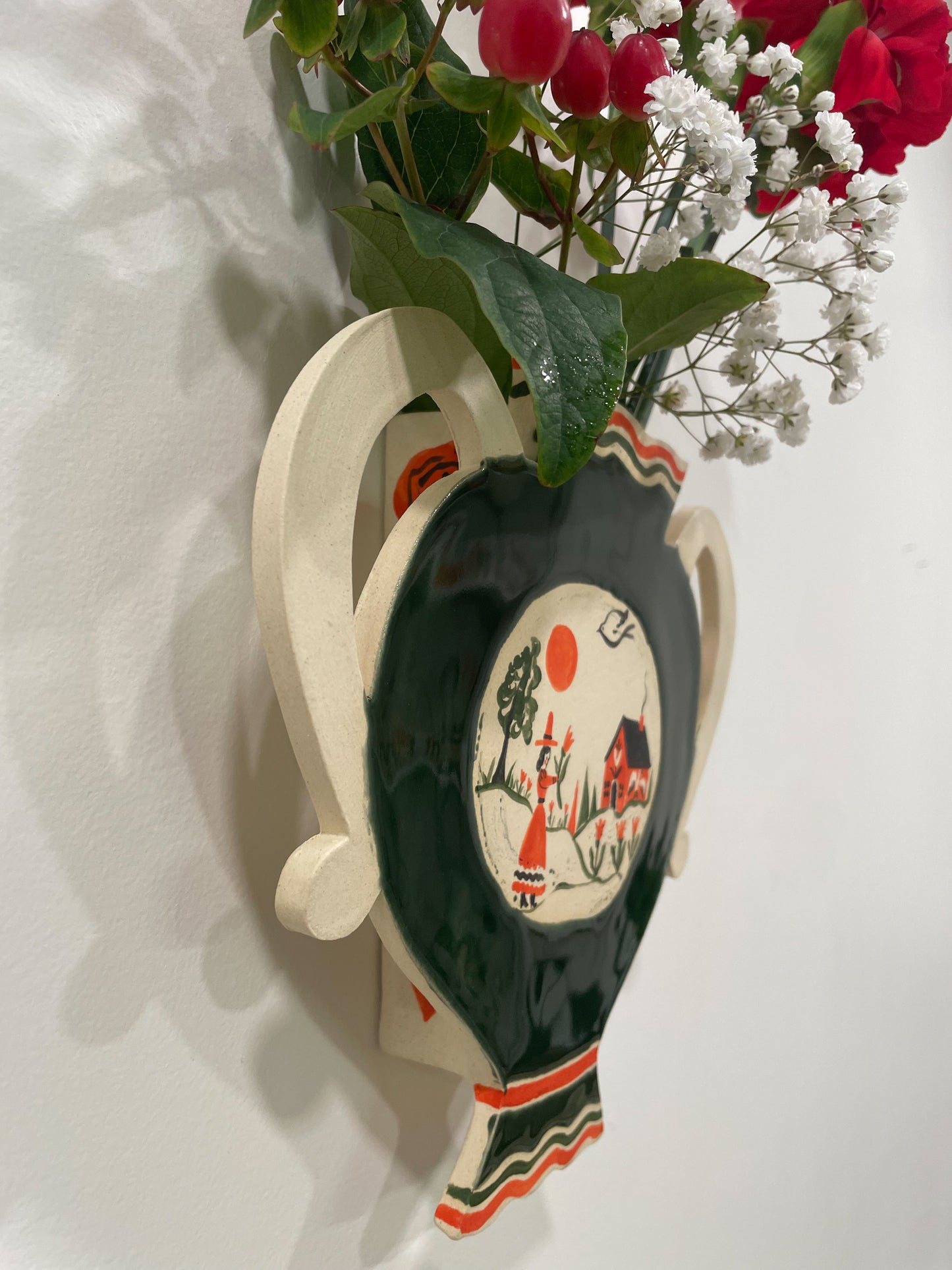 Folk scene wall vase