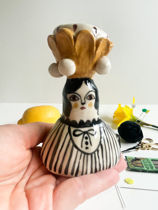 Folk lady pin cushion figurine