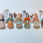 Clay doll wall ornament
