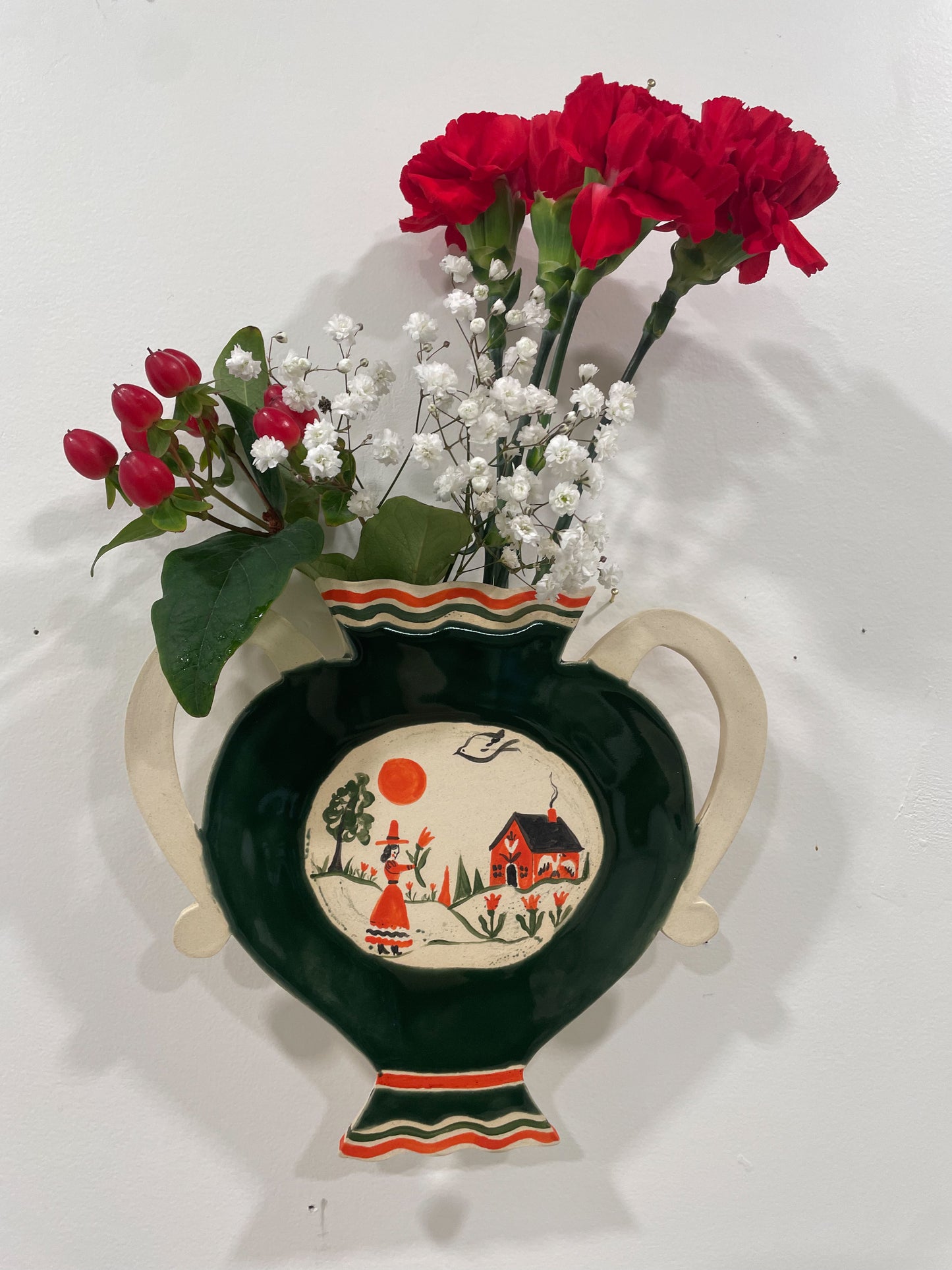 Folk scene wall vase