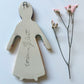 Clay doll wall ornament