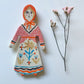 Clay doll wall ornament