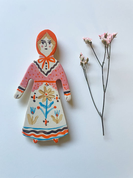 Clay doll wall ornament