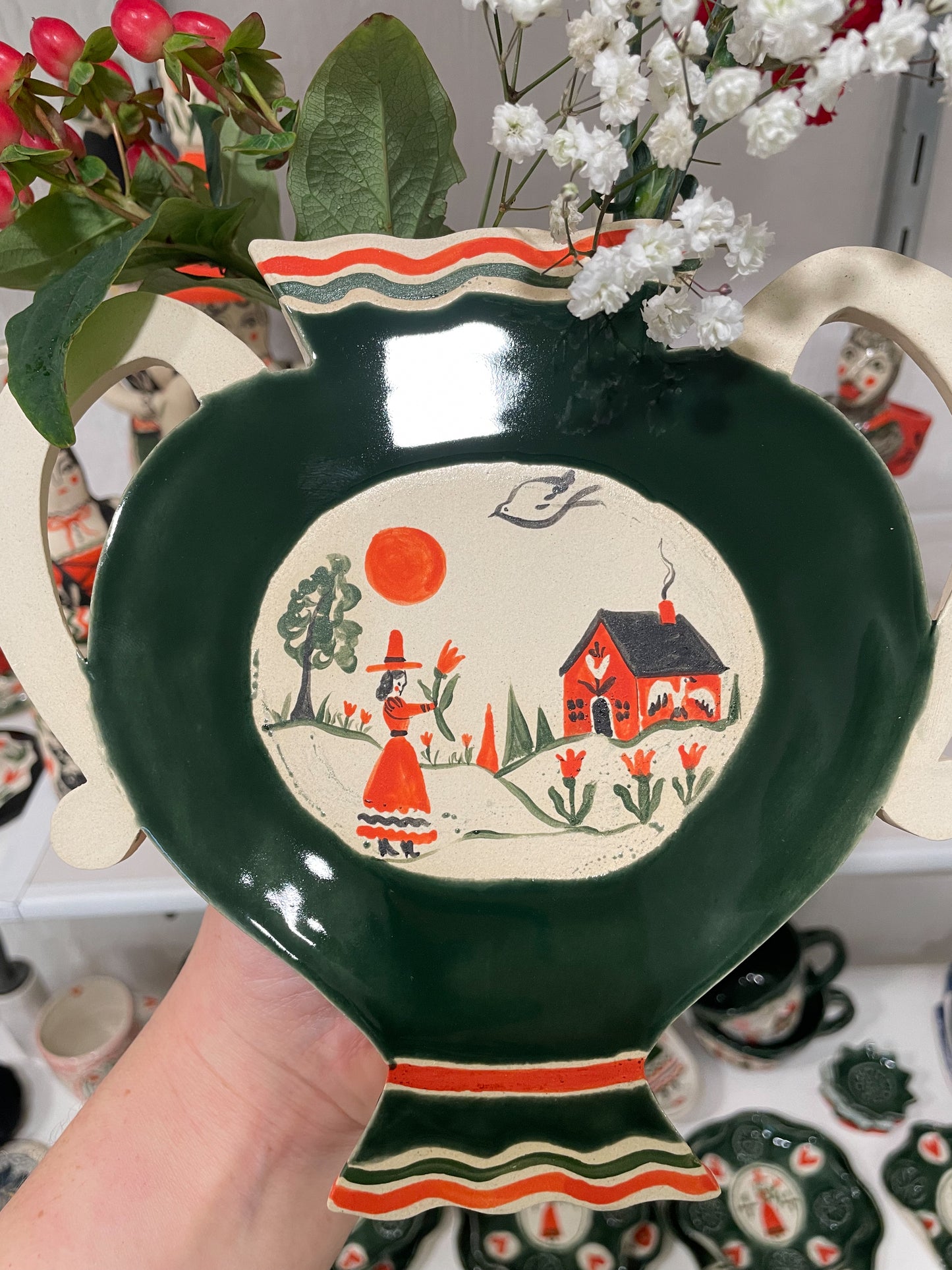 Folk scene wall vase