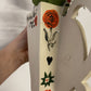 Folk scene wall vase