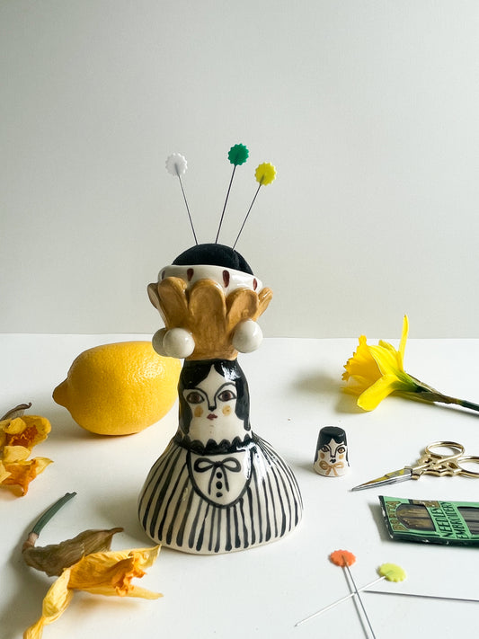Folk lady pin cushion figurine