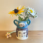 Pot head vase
