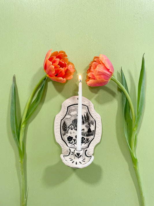 Witch in landscape wall candle