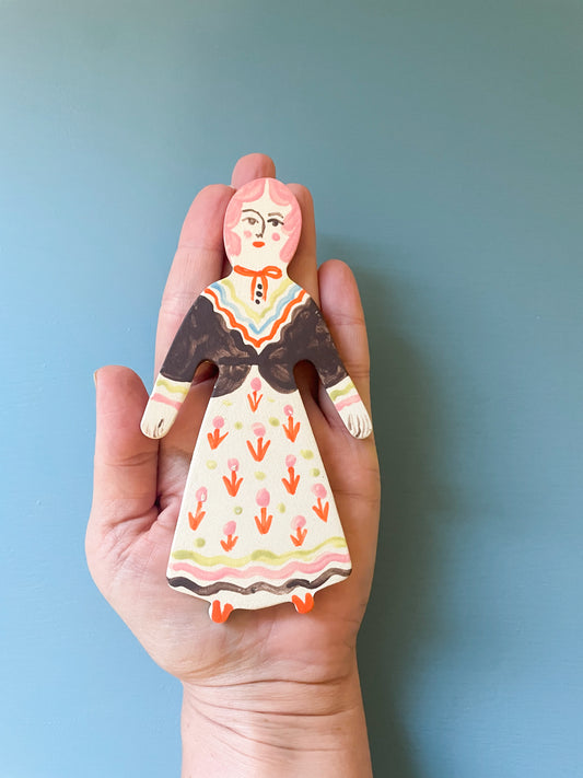 Clay doll wall ornament