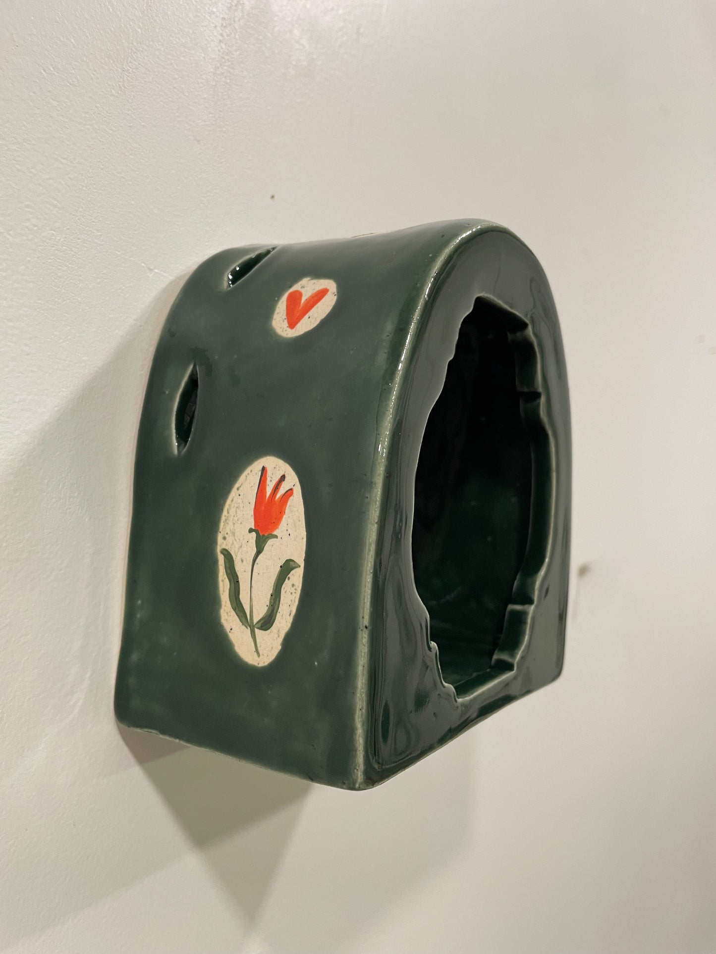 Glowing rose wall shrine